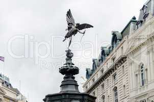 eros statue at piccadilly circus, london, uk