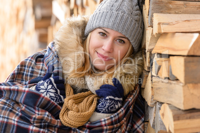 young woman cover in blanket posing winter