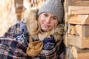 young woman cover in blanket posing winter