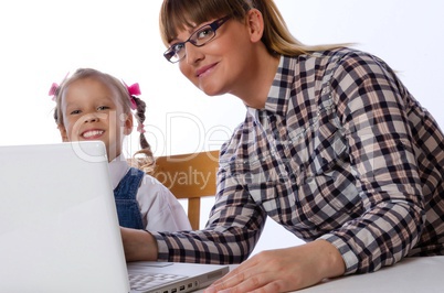 mother and daughter on the computer