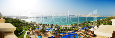 panorama of beach with a view on jumeirah palm man-made island,