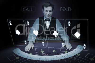 Smiling dealer with fanned out deck of cards