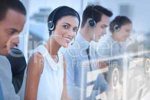 Smiling agent with colleagues sitting