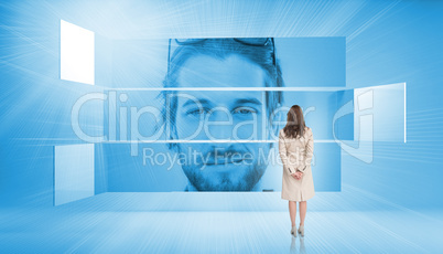 Rear view of businesswoman looking at smiling man