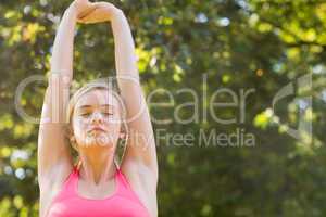 Active relaxed blonde doing yoga exercise