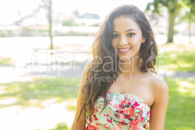 Stylish attractive brunette smiling at camera