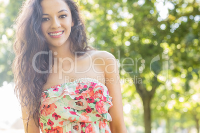 Stylish pretty brunette smiling at camera