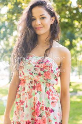 Stylish beautiful brunette smiling at camera