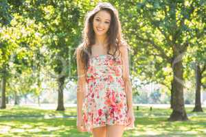 Stylish gorgeous brunette smiling at camera