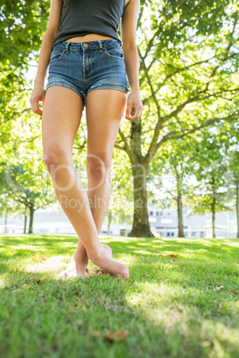 Casual gorgeous model standing on grass