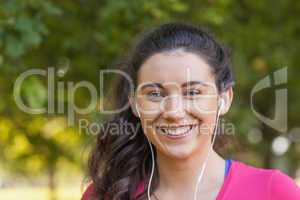 Content young woman listening to music