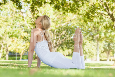 Attractive fit woman stretching