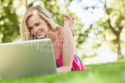 Nice young woman using her notebook