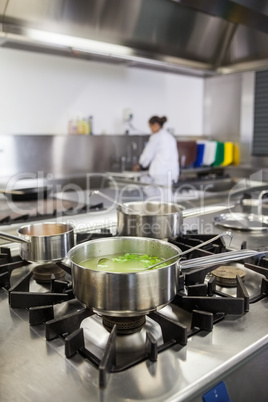 Several pots cooking on hotplate