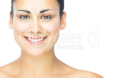 Front view of joyful woman smiling at camera