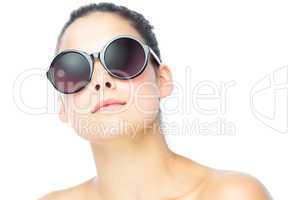 Young woman wearing big sunglasses