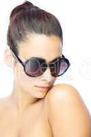 Pretty woman wearing gigantic round sunglasses