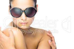 Cute brunette woman wearing round sunglasses