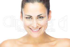 Front view of beautiful brunette woman smiling at camera