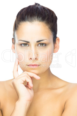 Front view of thinking cute woman looking at camera