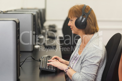 Female mature student working on computer