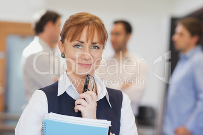 Lovely female mature student posing in classroom