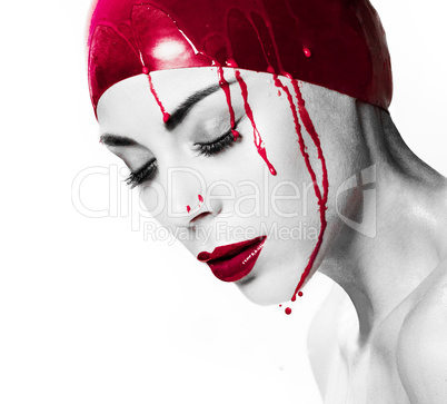 dramatic portrait of a bleeding woman