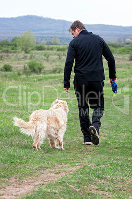 Young man walking with your dog