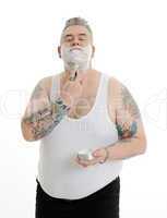 corpulent man with shaving foam in the face