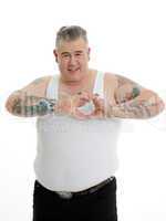 fat man in tank top is forming heart with his fingers