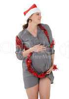 schwanger frau mit weihnachtsmütze