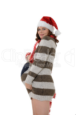 smiling pregnant woman with santa claus head