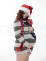schwangere Frau mit weihnachtsmütze