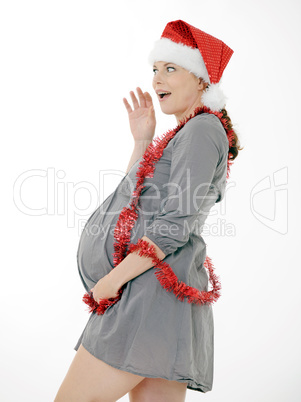 schwanger Frau mit weihnachtsmütze