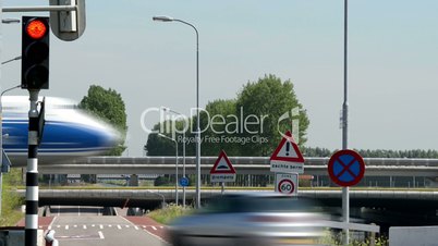 car airplane jet traffic on taxiway bridge and street 11051