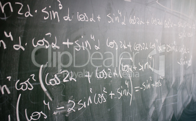 Blackboard with formulas and numbers