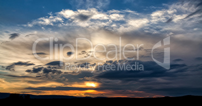 Dark storm clouds over grasslands