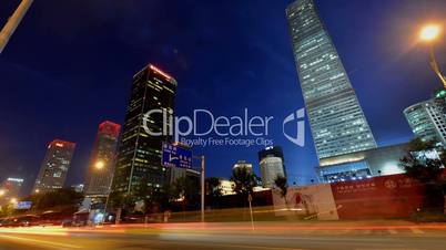 Traffic and buildings in Guomao CBD at night,Beijing,China