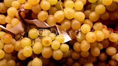 Up close image of the lots of yellow grapes big grapes