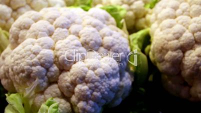 Set of big cauliflowers in the stand