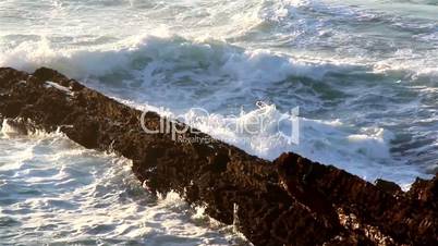 Waves smashing on the stones big waves splashing on big rocks