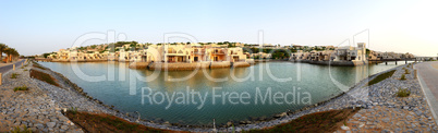 panorama of the luxury hotel during sunset and beach, ras al kha