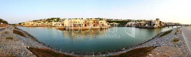 panorama of the luxury hotel during sunset and beach, ras al kha
