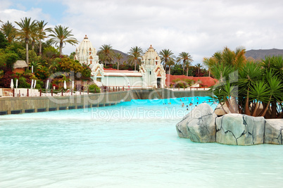 The tourists enjoying artificial wave water attractions in Siam waterpark, Tenerife, Spain
