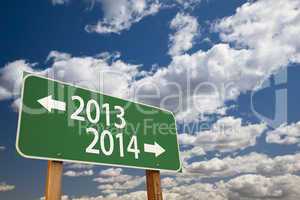 2013, 2014 green road sign over clouds