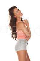happy relaxed young woman in skimpy shorts