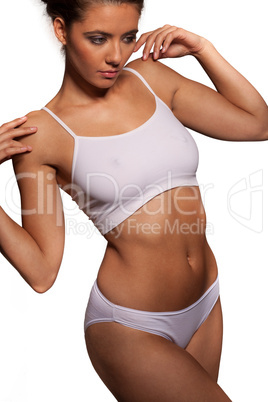 athletic woman in a sports bra and panties