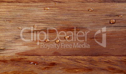 wooden kitchen board with water drops