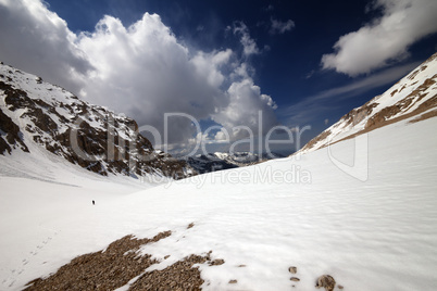 hiker in snowy mountains