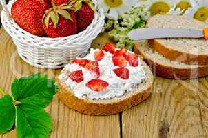 bread with curd cream and strawberries with a basket
